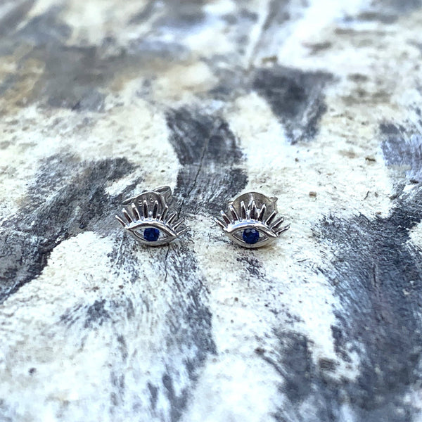Sterling Silver Evil Eye Studs with lashes and blue cubic zirconia