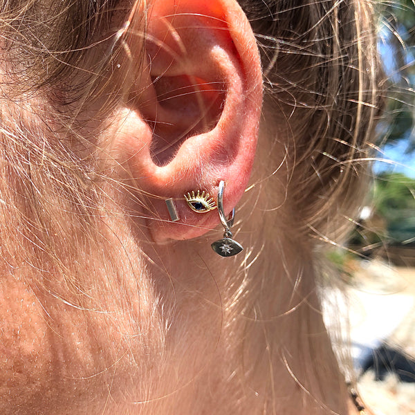 Sterling Silver Evil Eye Studs with lashes and blue cubic zirconia