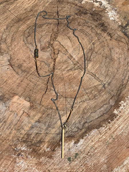 Silver curb link chain with pyrite and brass bar detail