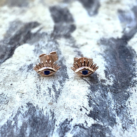 Sterling Silver Evil Eye Studs with lashes. 18k yellow gold plated, blue cubic zirconia