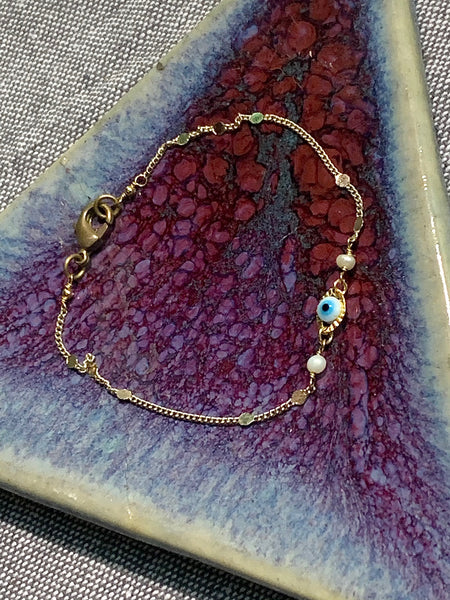Evil Eye, Medium Blue, Dainty Fancy Chain - 14k plated gold bracelet with Fresh Water Pearls