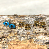 Sterling Silver Evil Eye Studs with lashes. 18k rose gold plated, blue cubic zirconia