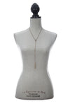 Laborde Designs Jewelry Nailah Brass Charm Lariat Necklace Model