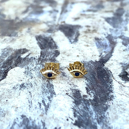 Sterling Silver Evil Eye Studs with lashes. 18k rose gold plated, blue cubic zirconia